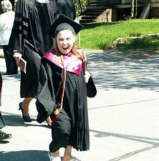 Mal walking on graduation day