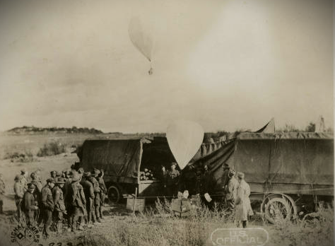 Leaflet balloons being launched by British troops.