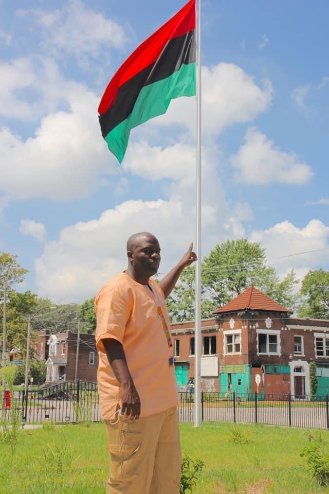 Ticharwa Masimba with African flag